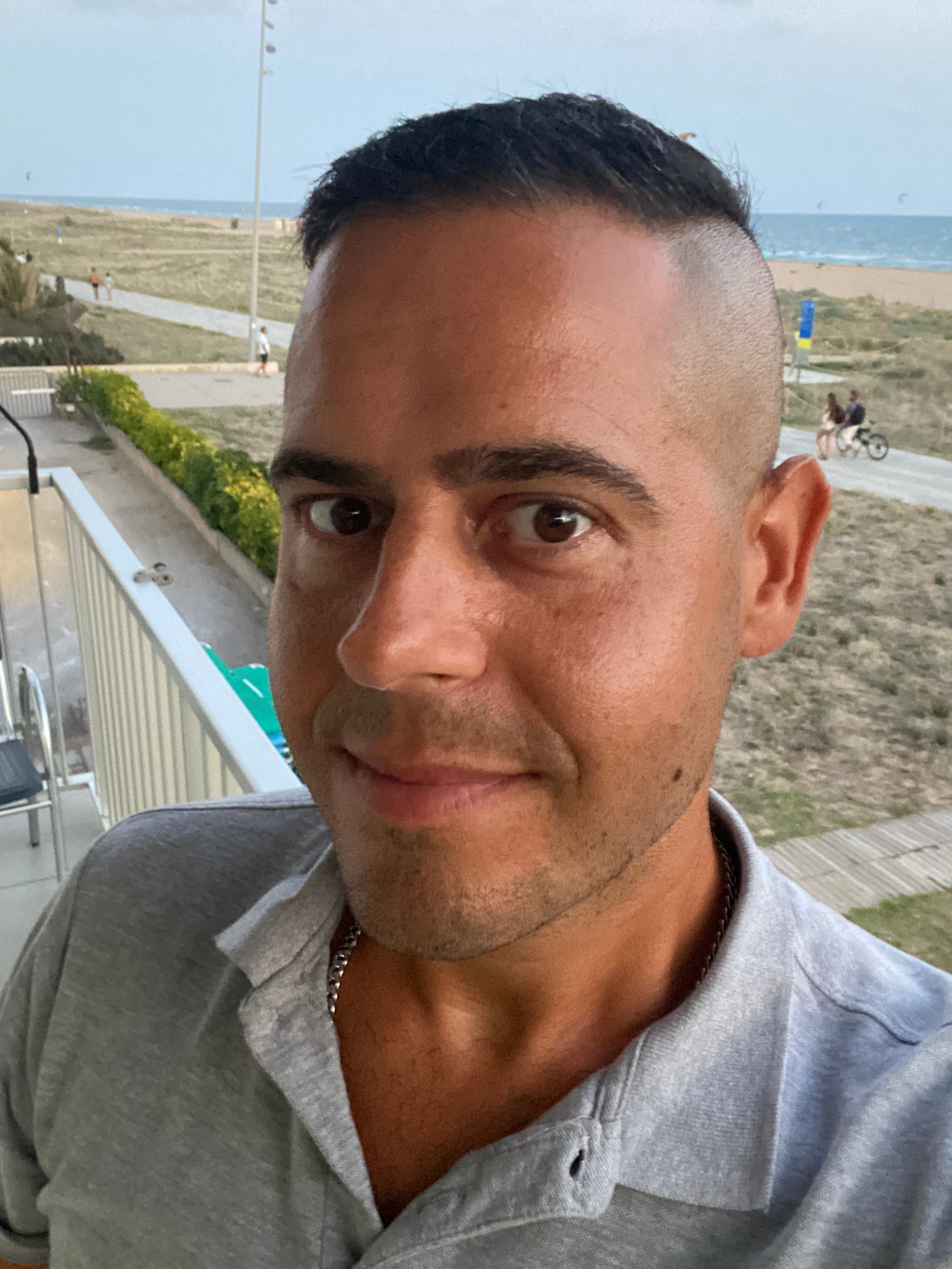 Jon Riesel on a seaside balcony in Castelldefels
