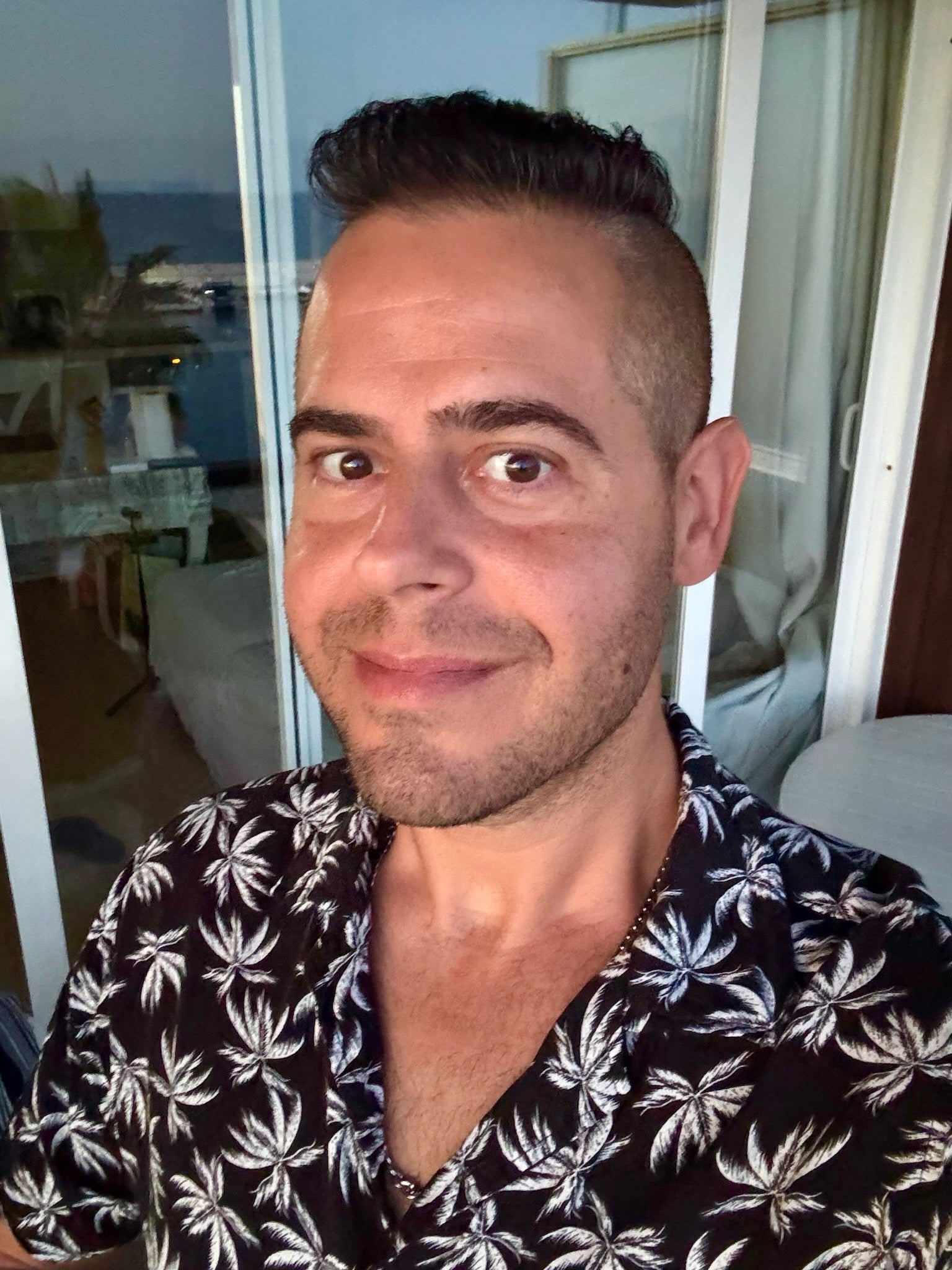 Jon Riesel in Marbella with the sea behind him